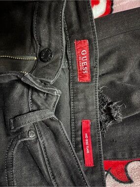 GUESS Black Mid-Rise flared ripped jeans